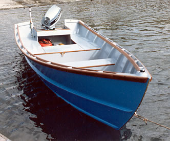 Bow view of wood boat layed out for fishing