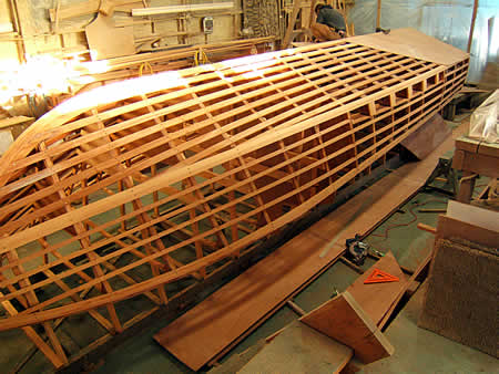 Custom cold-molded wooden boat building The Nexus 29