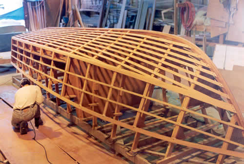 Custom cold-molded wooden boat building The 20' Coho