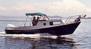 The 23' Dory, a fine custom wood dory for island camping and cruising